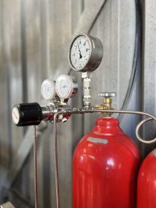 Hydrogen storage cylinders filled by H2X